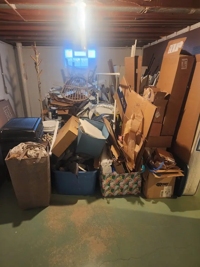 Roll-off dumpster container at job site for 2 Yard Dumpster Rental in Tolono